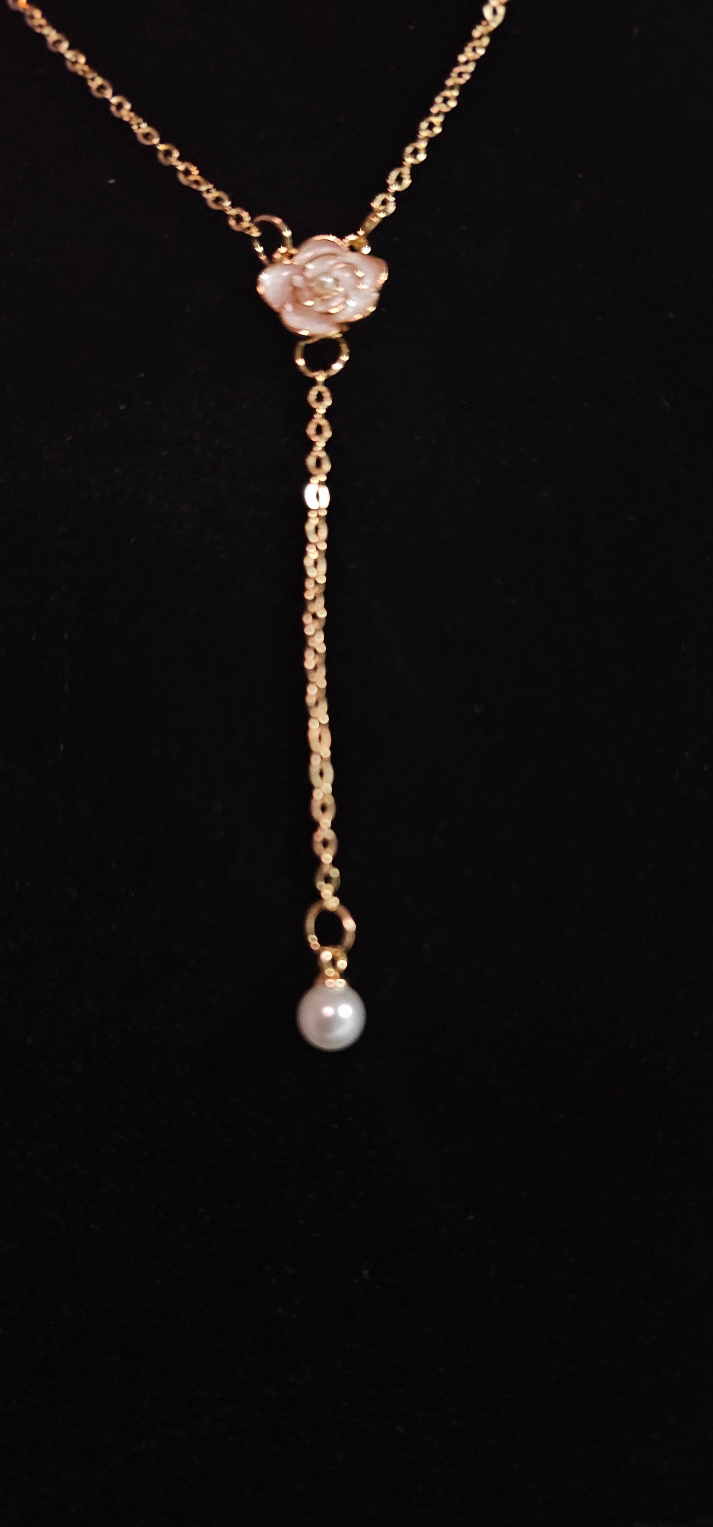 Pear drop necklace with camellia flower