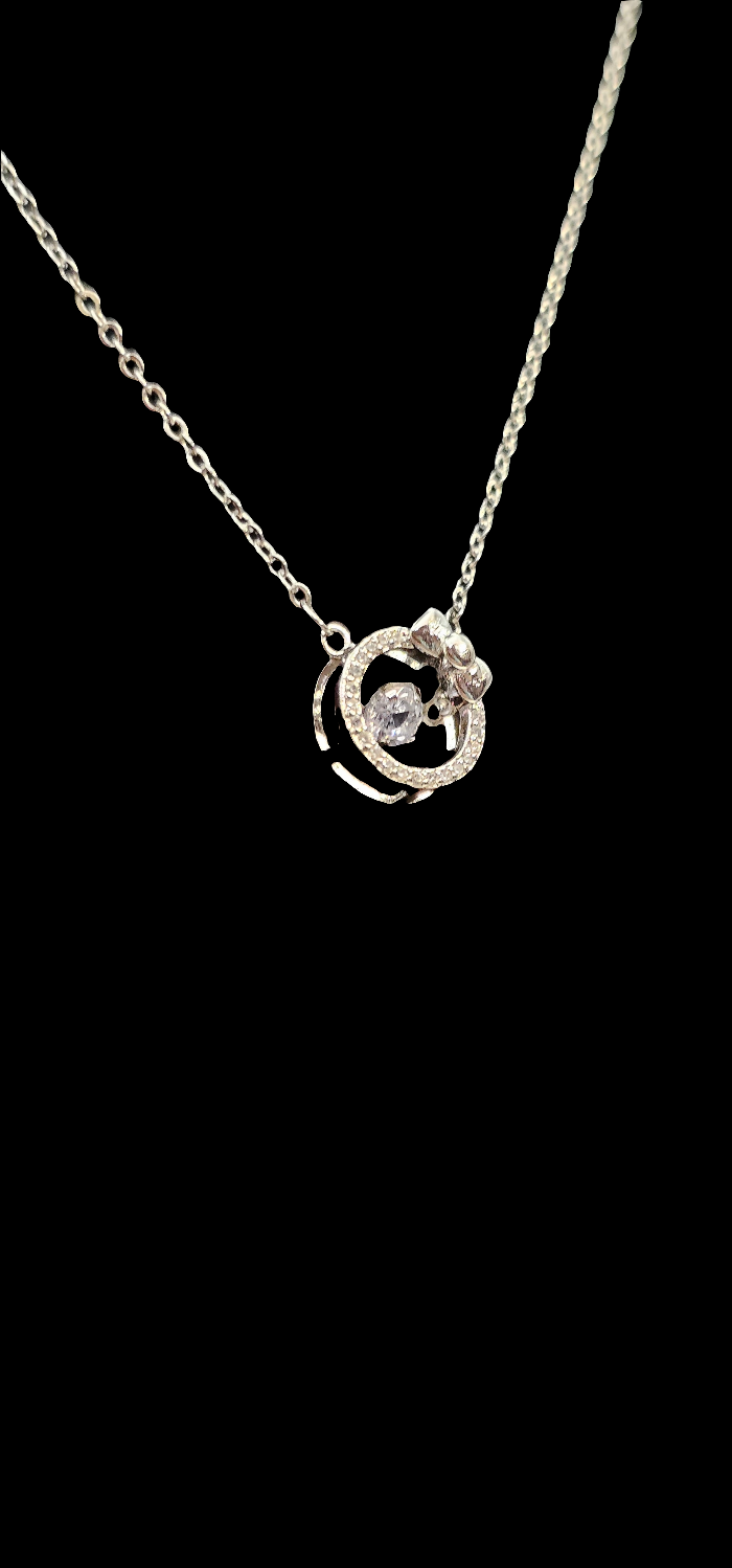 SILVER CIRCLE WITH BOW NECKLACE