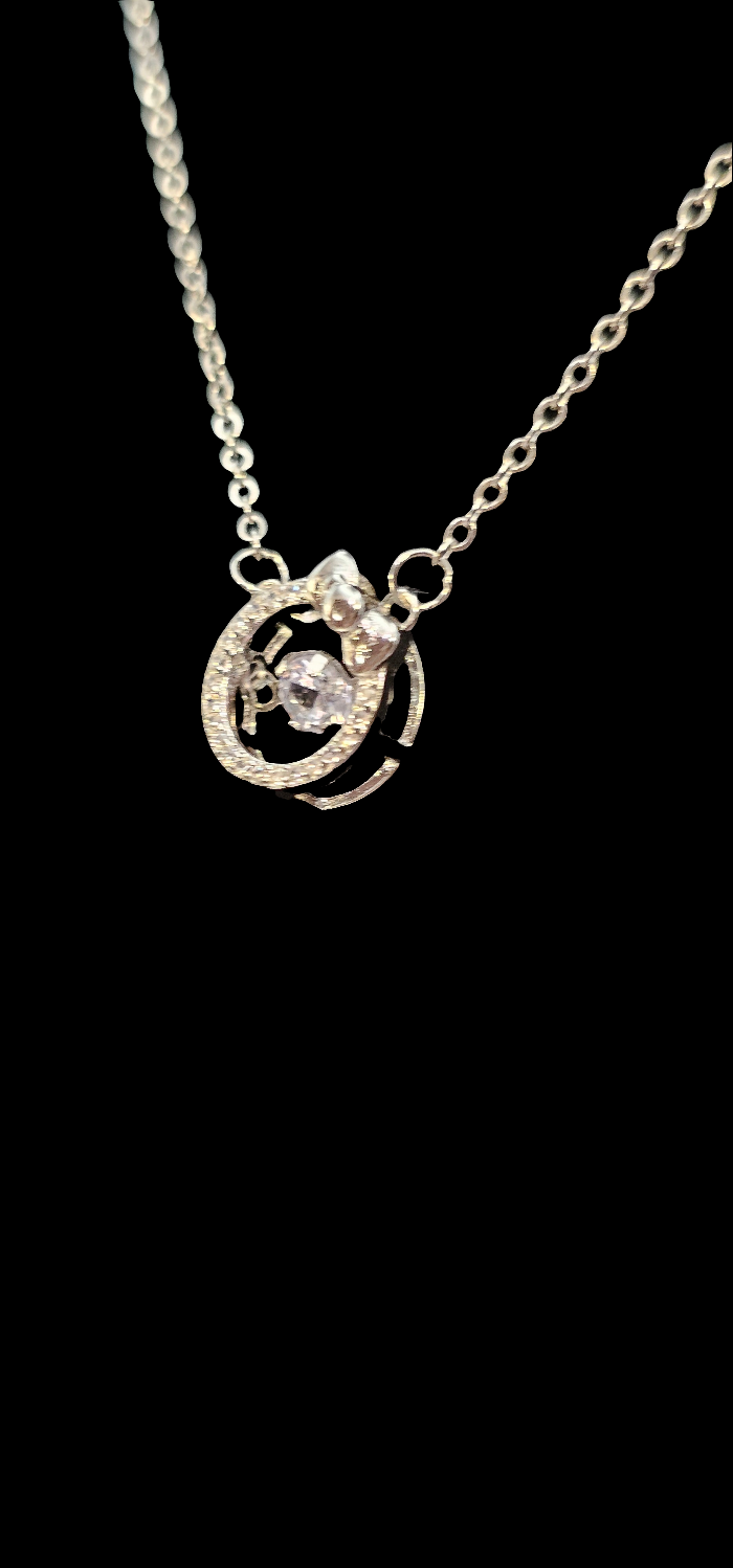 SILVER CIRCLE WITH BOW NECKLACE