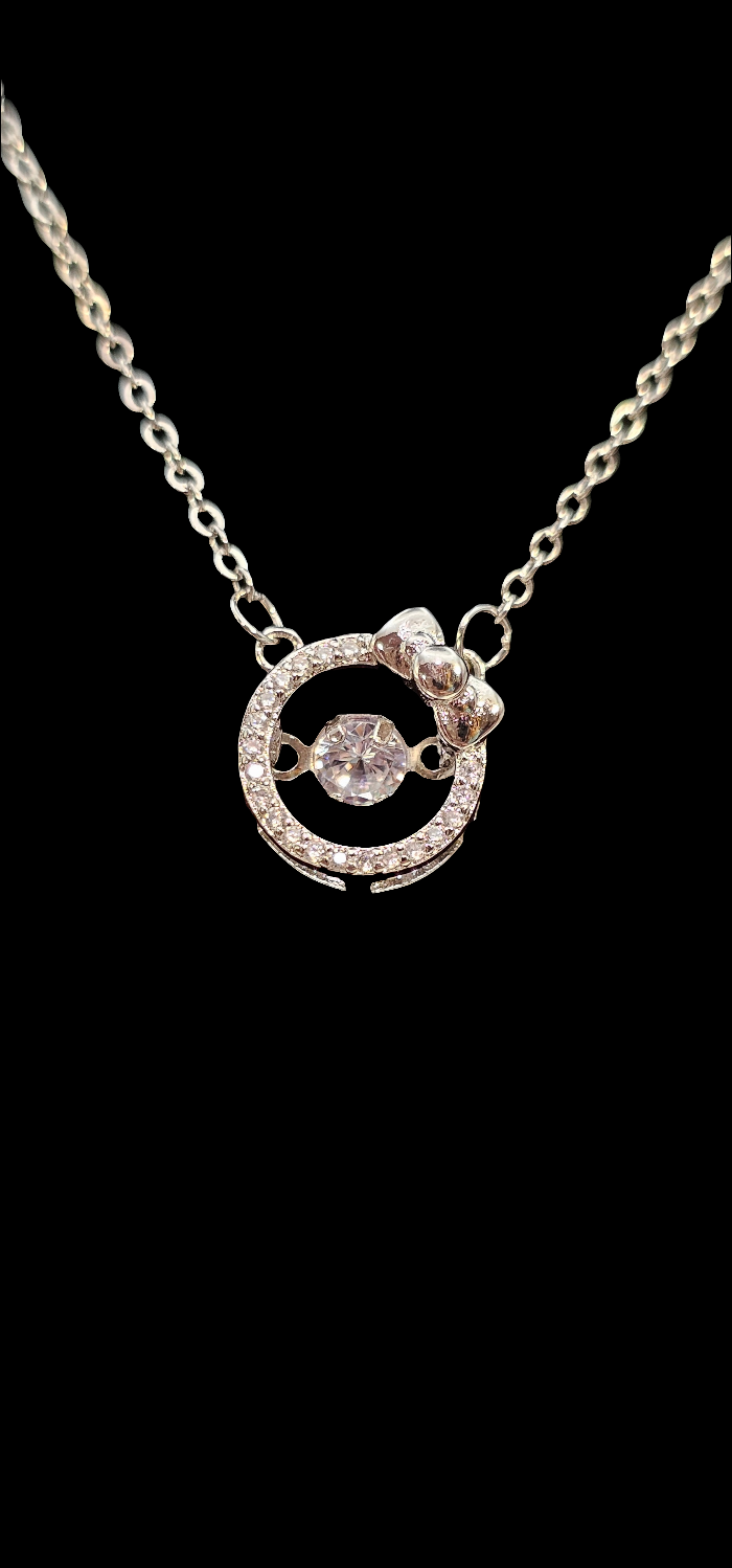 SILVER CIRCLE WITH BOW NECKLACE
