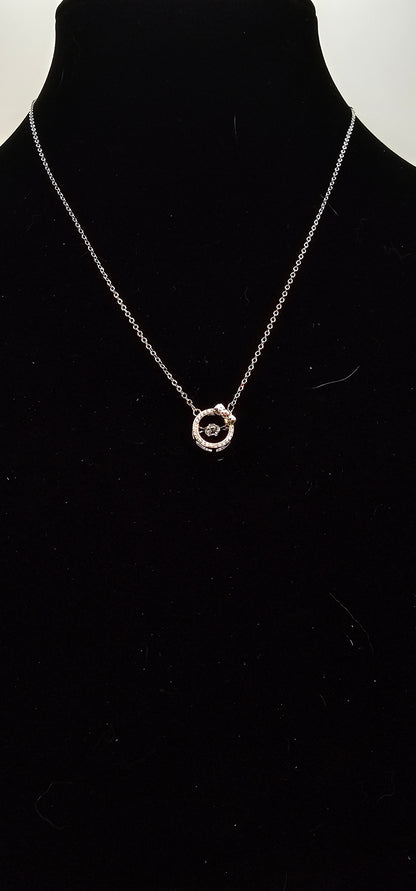 SILVER CIRCLE WITH BOW NECKLACE