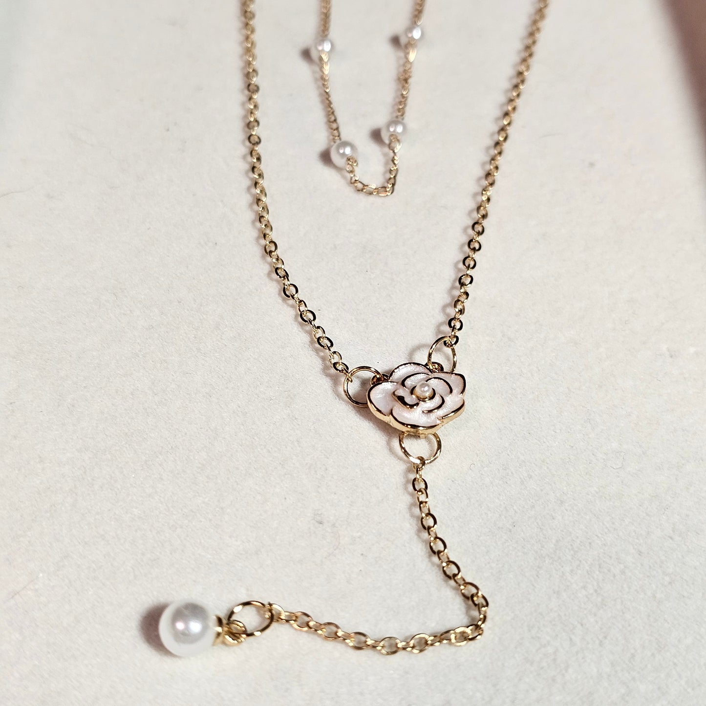 Pear drop necklace with camellia flower