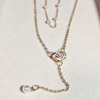 Pear drop necklace with camellia flower