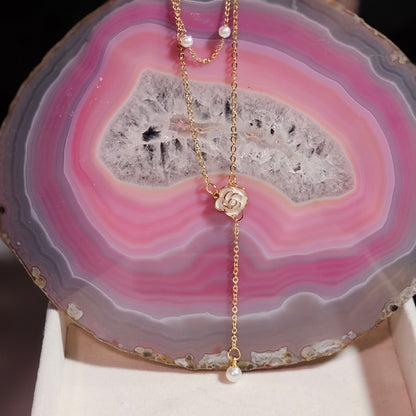 Pear drop necklace with camellia flower