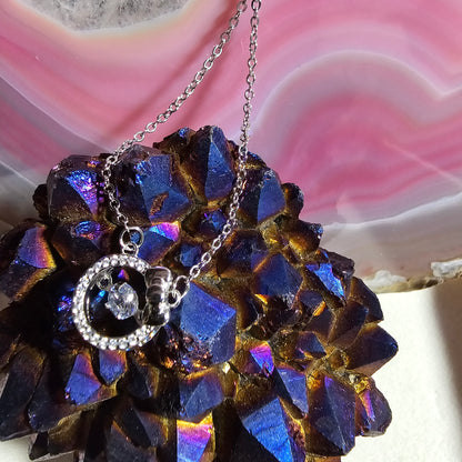 SILVER CIRCLE WITH BOW NECKLACE