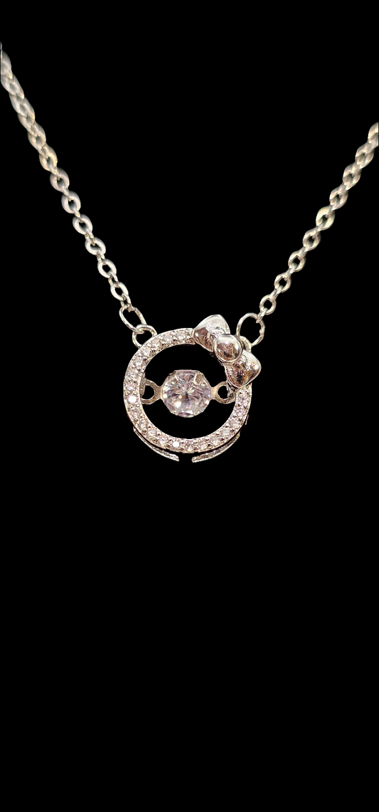 SILVER CIRCLE WITH BOW NECKLACE